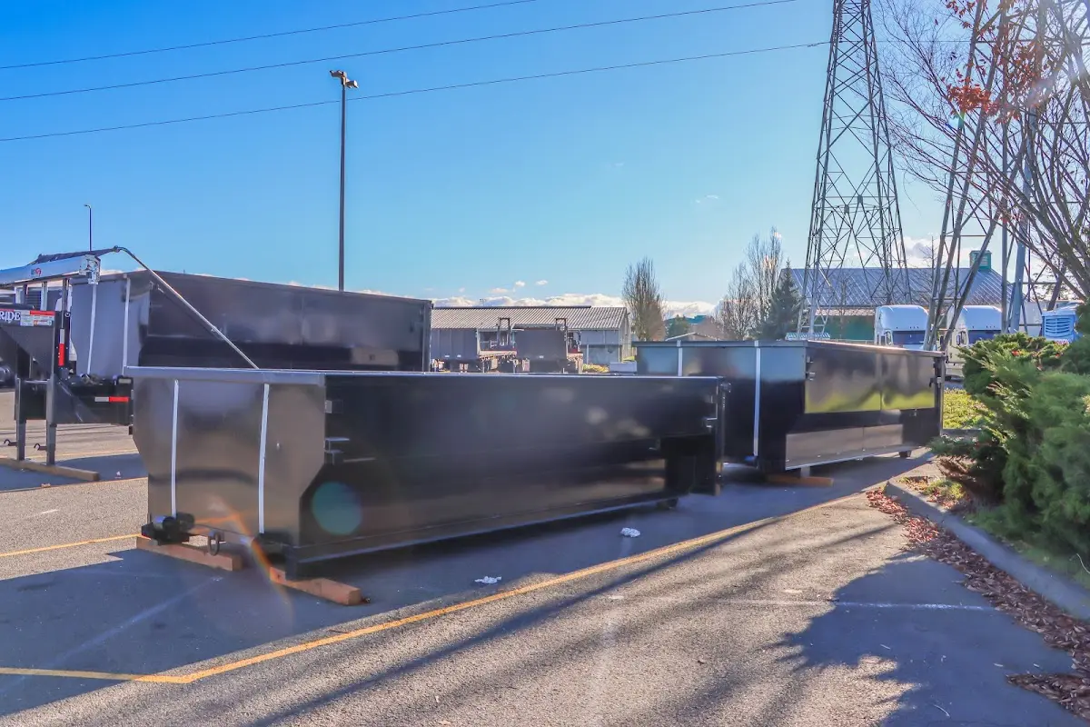 Roll-off dumpster ready for waste disposal at job site for 2 Yard Dumpster Rental in Portage